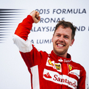 Strategy gives win to Vettel and Ferrari