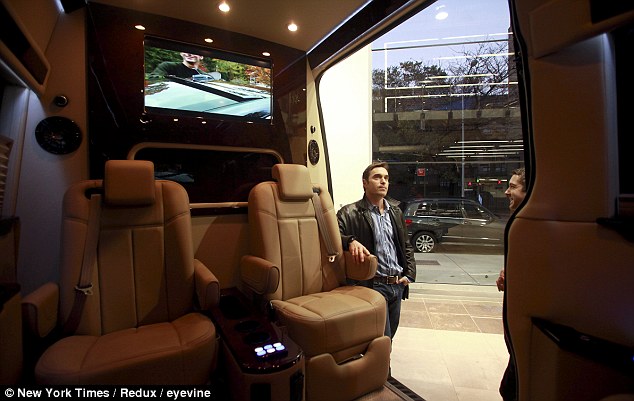 Driving commuters around the Benz: New York City's wealthiest enjoy hidden luxury in Mercedes vans that take up half the road