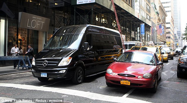 Driving commuters around the Benz: New York City's wealthiest enjoy hidden luxury in Mercedes vans that take up half the road