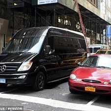 Driving commuters around the Benz: New York City's wealthiest enjoy hidden luxury in Mercedes vans that take up half the