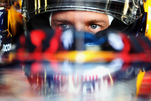 Vettel conquers pole in Spa