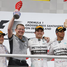 Rosberg went up to the podium alongside Valteri Bottas and Lewis Hamilton