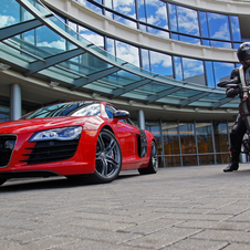 The image shows and Audi R8 and Ducati Diavel outside what appears to be the Audi headquarters