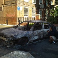 Cars being destroyed with London riots