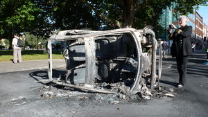 Cars being destroyed with London riots