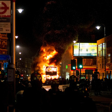 Cars being destroyed with London riots