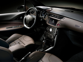 The interior of the DS3 DS World Paris has an inlaid plaque to celebrate the opening