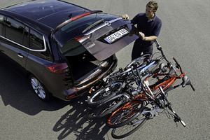 The bikes fold down to open the rear hatch