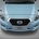 The car has relatively basic styling with a diamond-shaped front grill