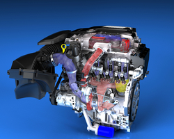 The engine features two small turbos, a top-mounted throttle body and short distances between the turbo and engine