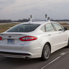 The car includes four LiDAR light-emitting sensors