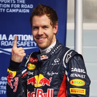 Vettel celebrating his first pole position of the season