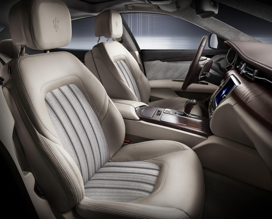 The interior gets high quality, moka leather