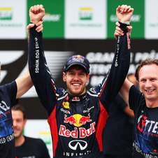 Sebastian Vettel, Christian Horner and Adrian Newey celebrate the win