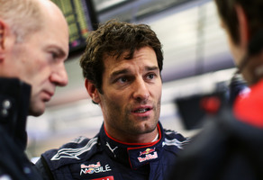 Webber takes pole in rainy practice