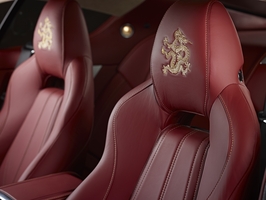 Gold dragons are also embroidered into the headrests