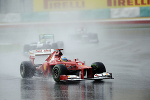 Alonso takes win in wet race in Sepang