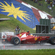 Alonso takes win in wet race in Sepang