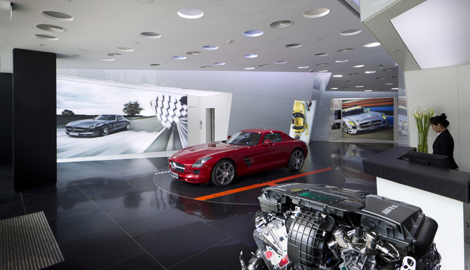 A turntable near the window allows cars to be displayed