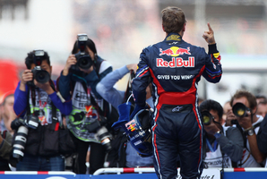 Vettel retunrs to wins and hands title to Red Bull