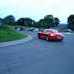 Red Porsche Cayman S drifting